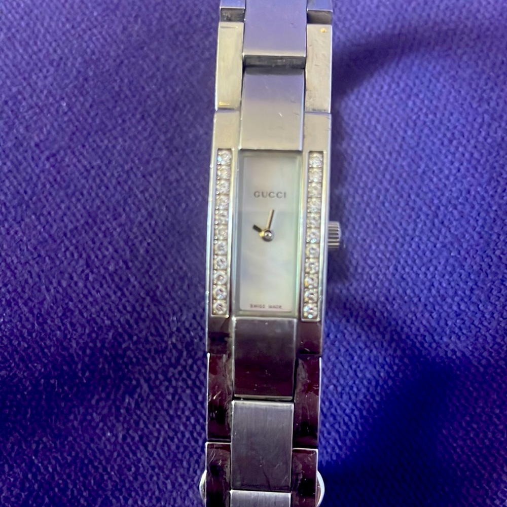 Gucci watch women mother of Pearl face with diamonds